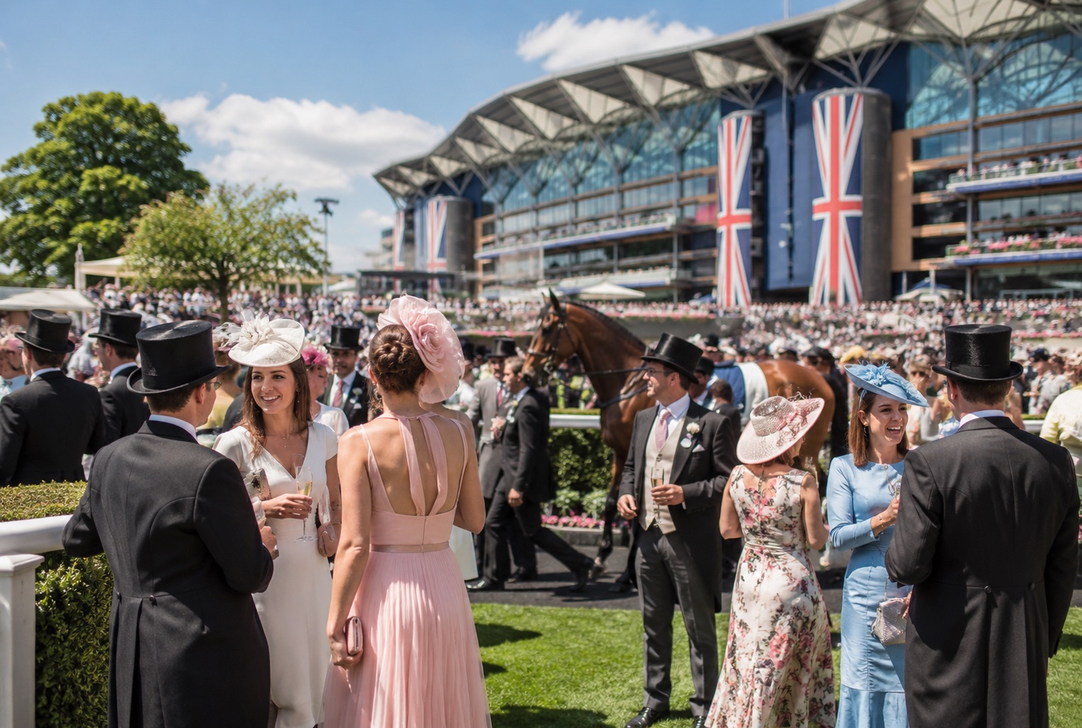 Elegant race day guests enjoying the horses at Ascot.